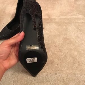 Women’s black shiny heels size 7.5